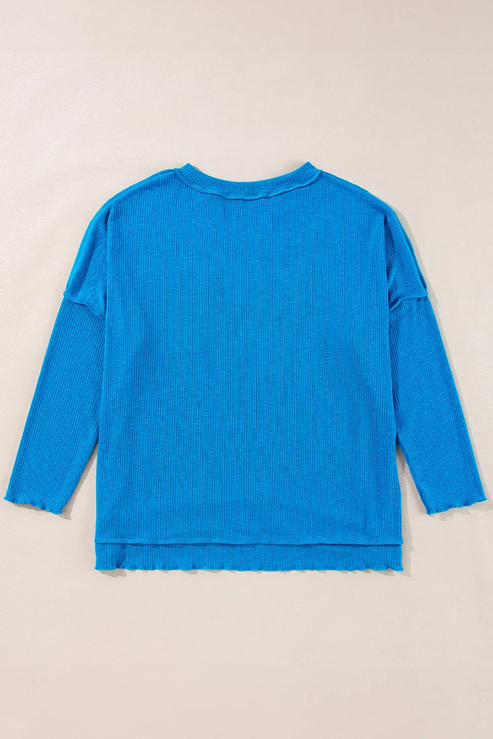 Exposed Seam Notched Long Sleeve Blouse